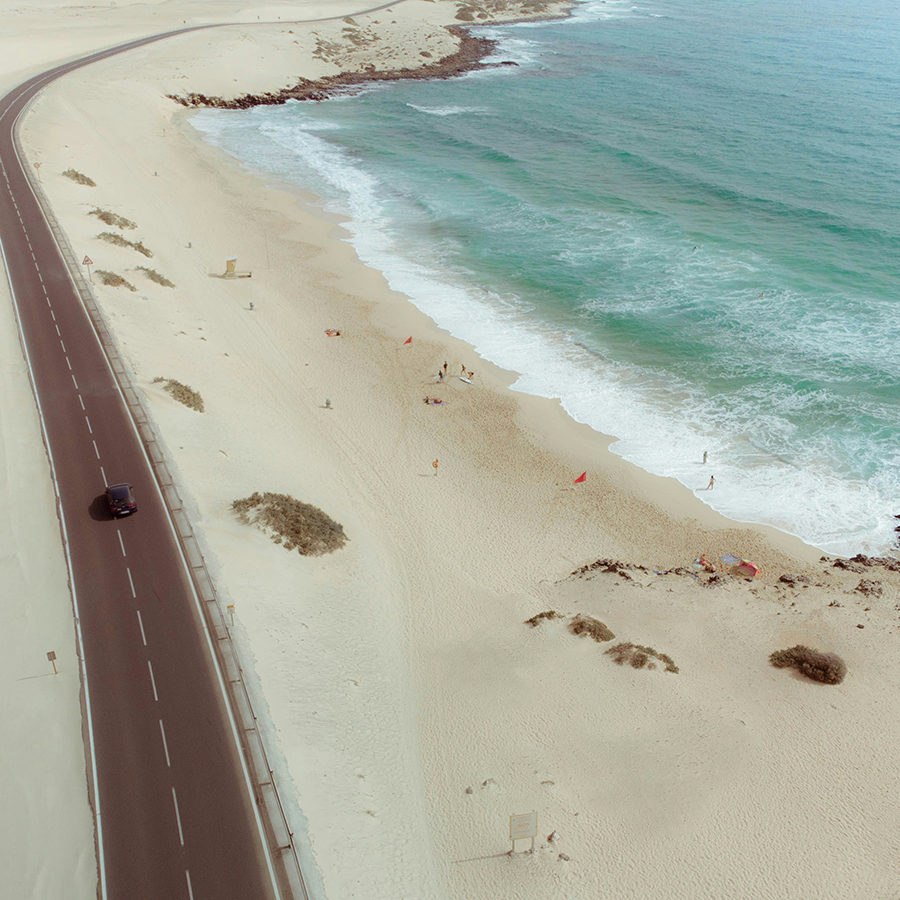 Road running alongside coast